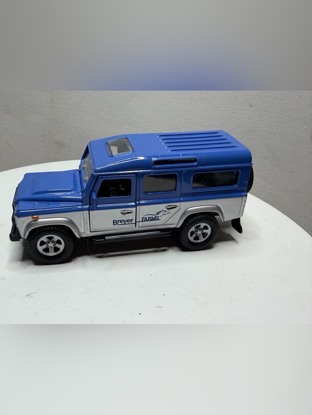 Breyer Blue and Silver Die-Cast Land Rover SUV Toy
